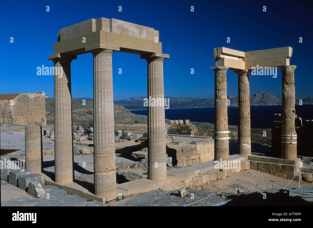 Old ruins of building under clear blue sky, Dodecanese Islands, Greece Stock Photo