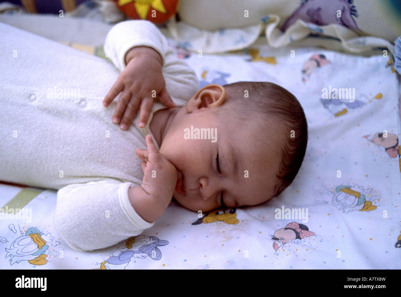 nine day old baby sleeping in crib Stock Photo Alamy
