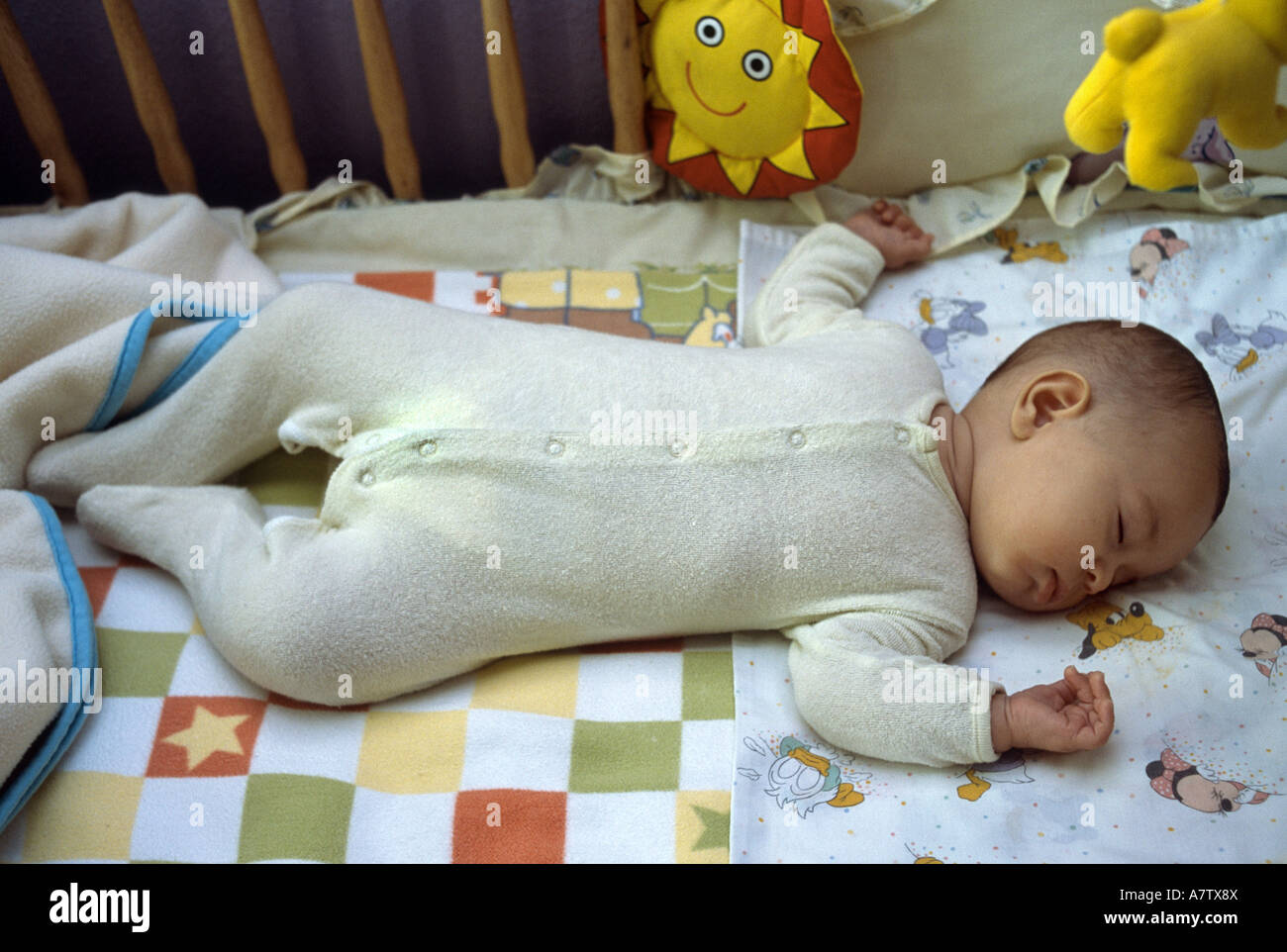 nine day old baby sleeping in crib Stock Photo Alamy