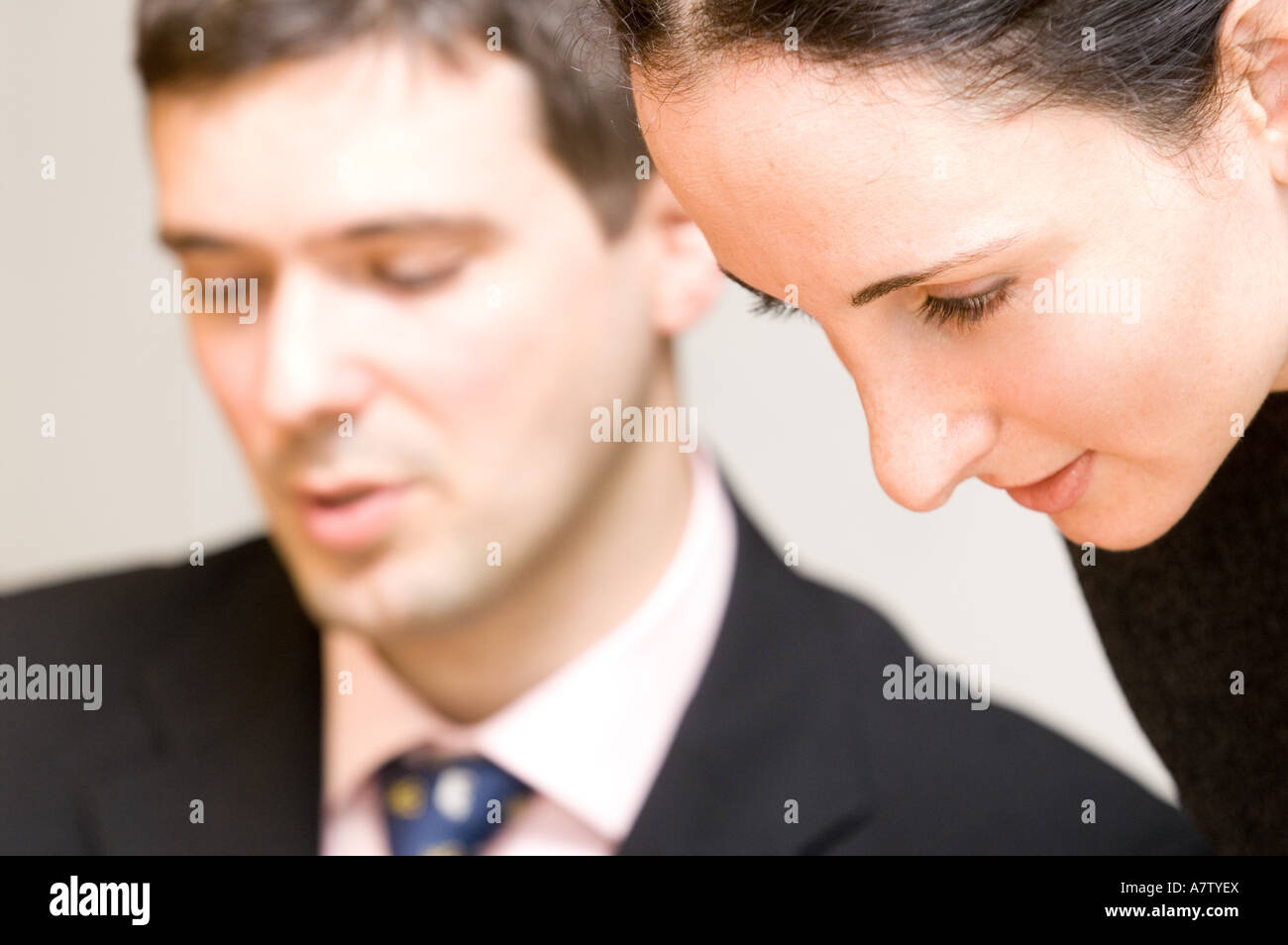 businessman and businesswoman discussing Stock Photo