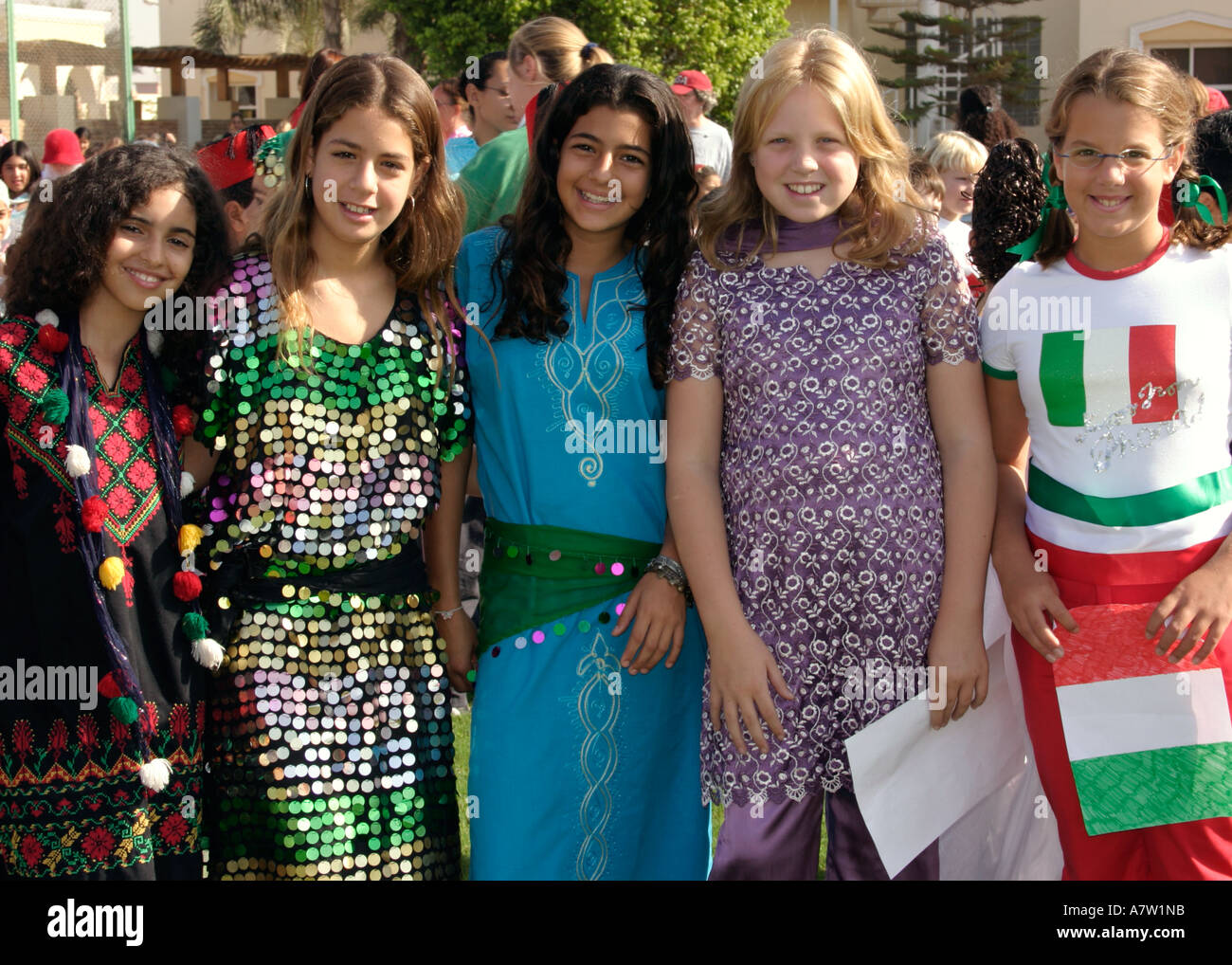 school girls dressing in different cultural costumes on UN day Stock Photo