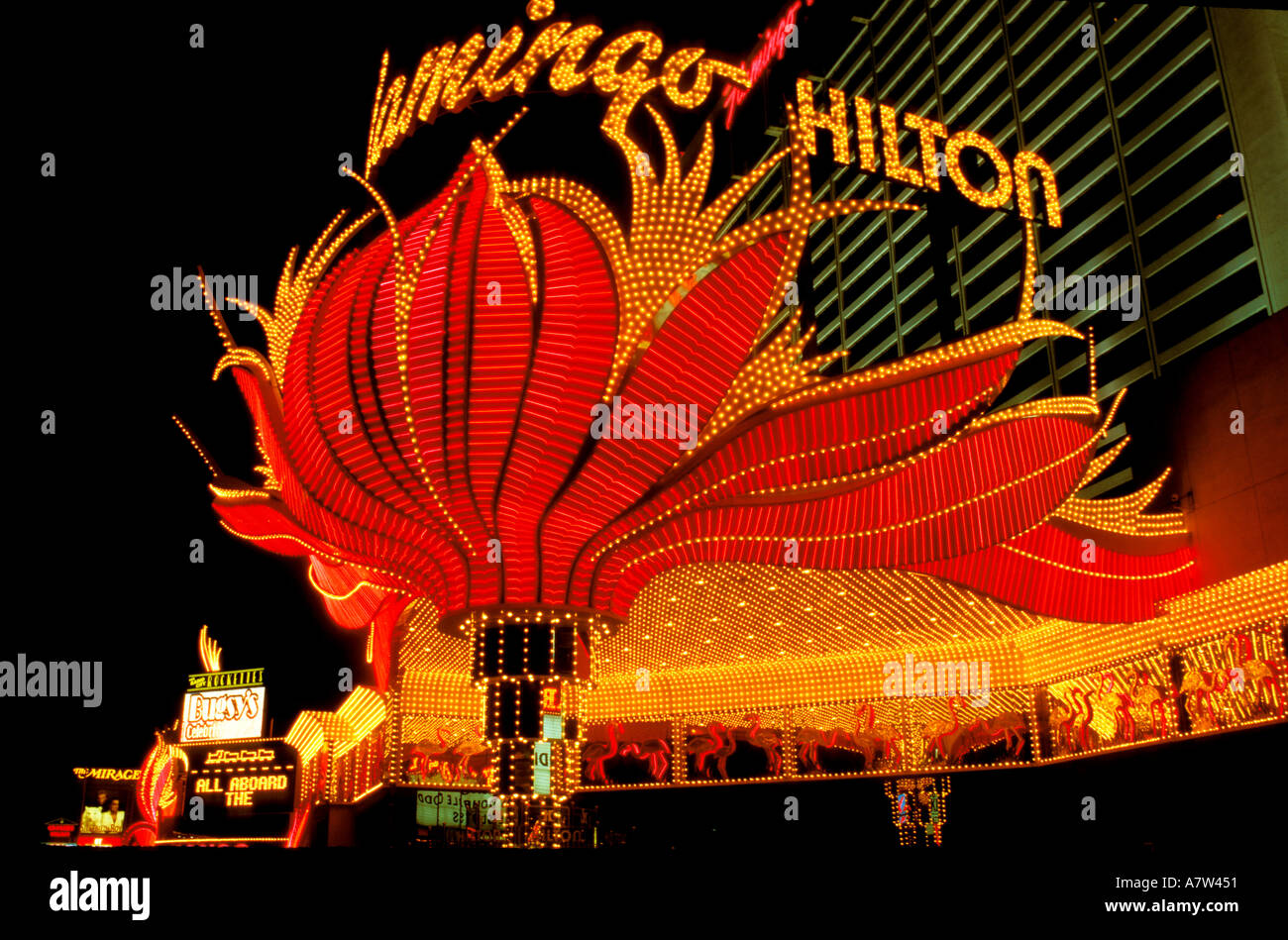 The Flamingo Hotel in Las Vegas NV is a blaze of neon and tungsten lights Stock Photo