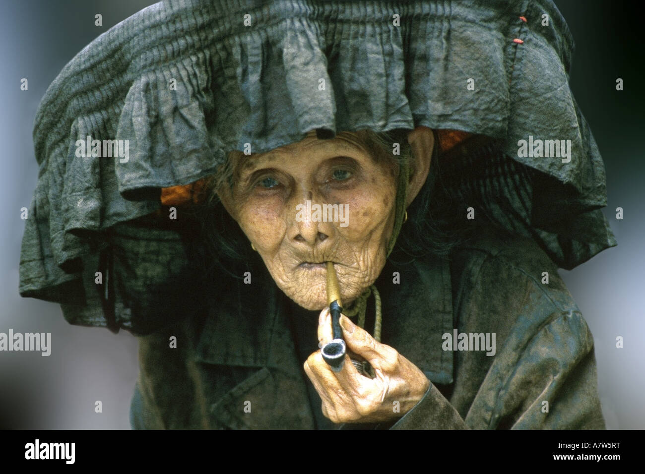 Hakka woman smoking opium, China, Hongkong Stock Photo