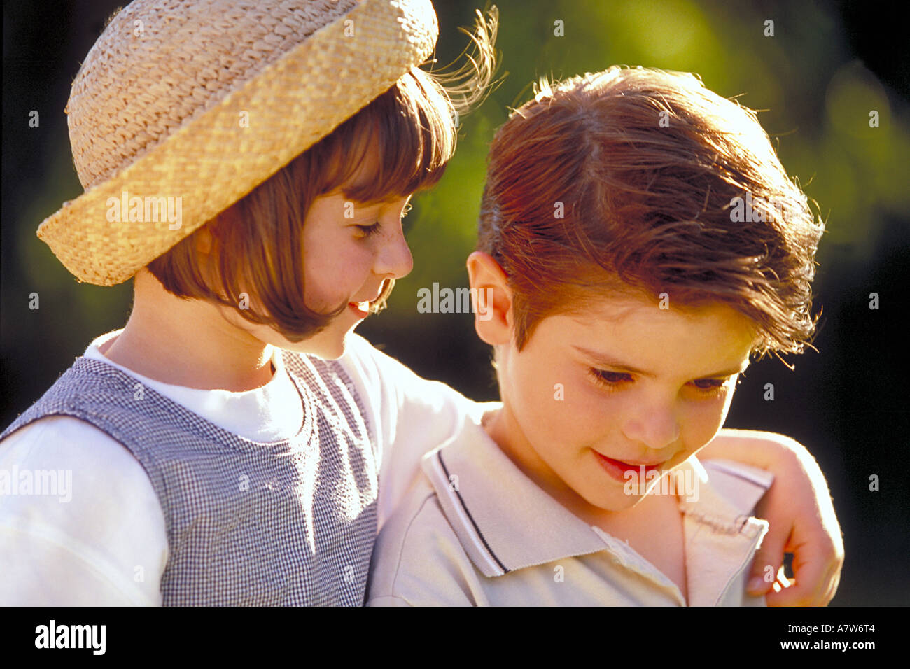 portrait of a boy and girl standing outside Stock Photo - Alamy