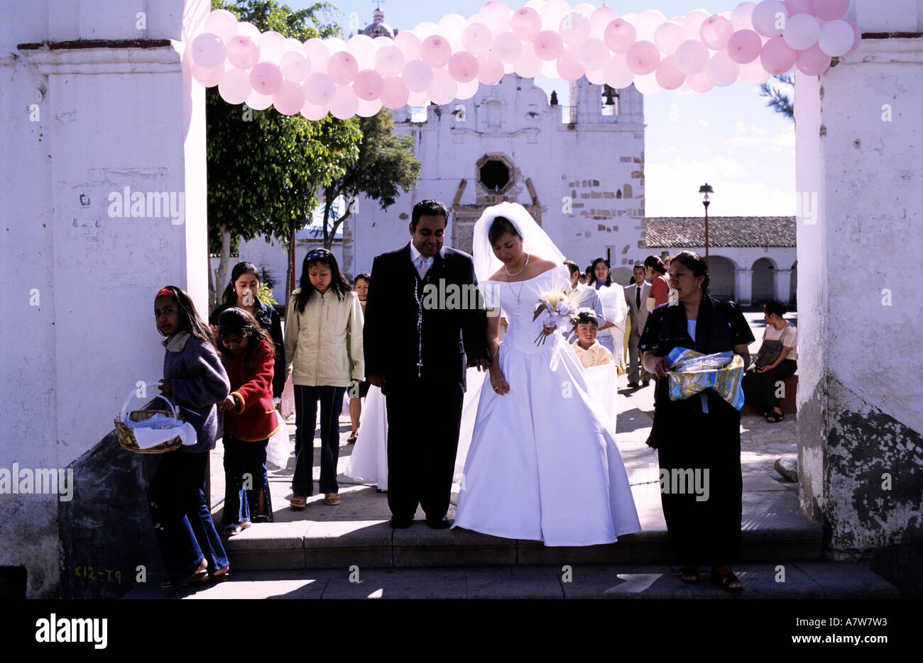 Mexico, Oaxaca State, Teotitlan del Valle, newlyweds leaving the church Stock Photo