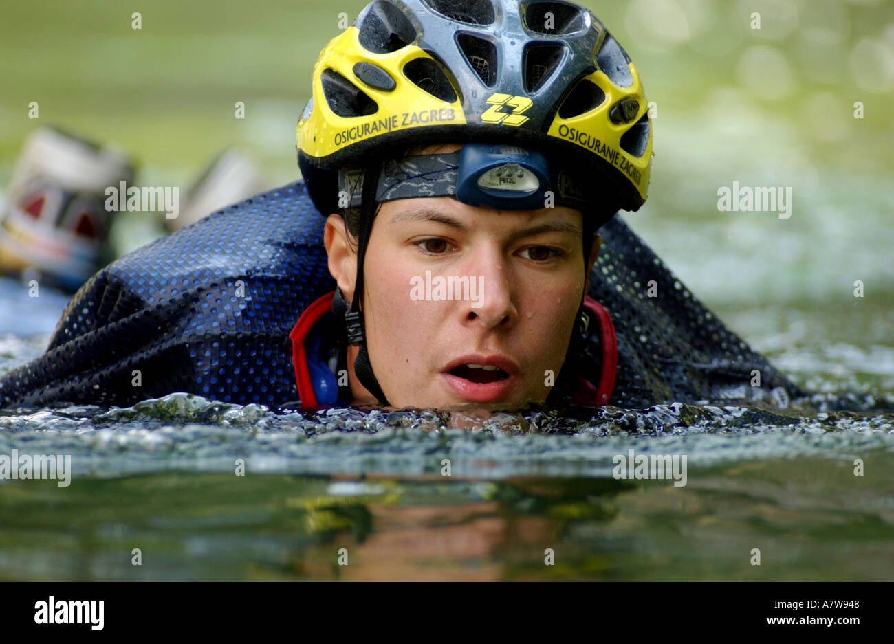 Woman canyoneering during an Adventure race Stock Photo Alamy