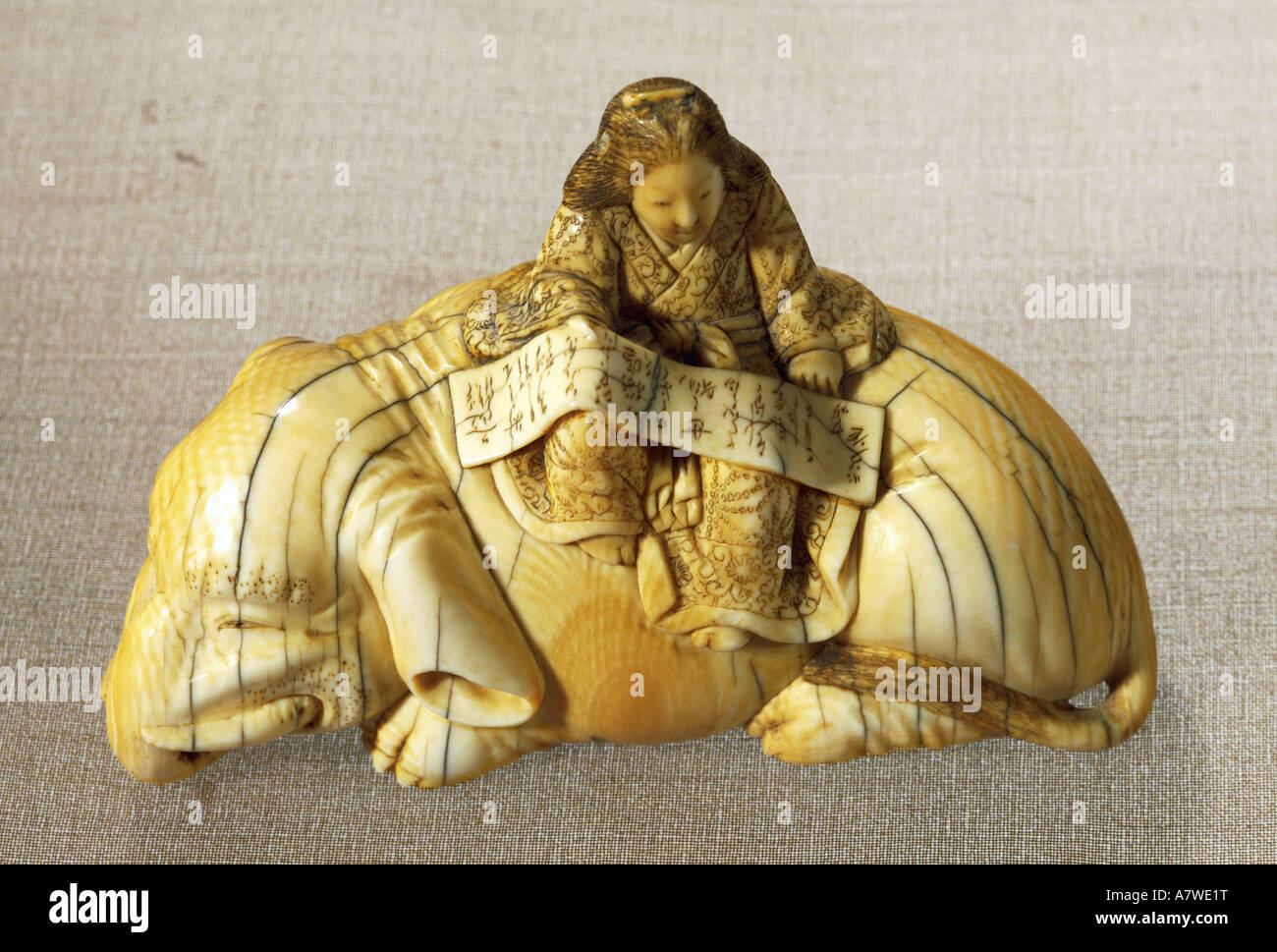 fine arts, Japan, ivory, Netsuke (stop button), lady sitting on an elephant, sculpture by Tomochika, 19th century, private collection, , Artist's Copyright has not to be cleared Stock Photo
