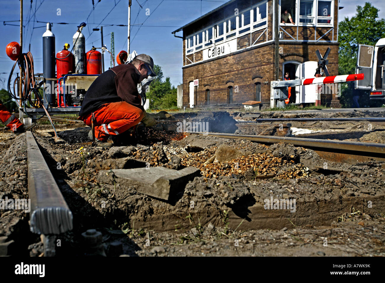 Track construction at a railway level crossing near Calau in Niederlausitz, Brandenburg, Germany Stock Photo