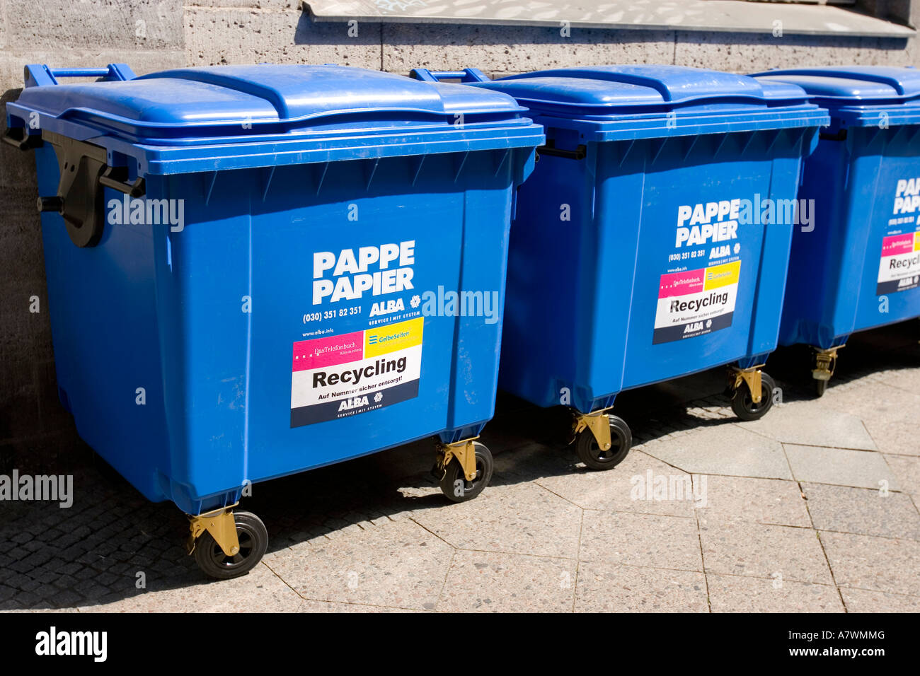 Blue recycling container for paper waste Stock Photo