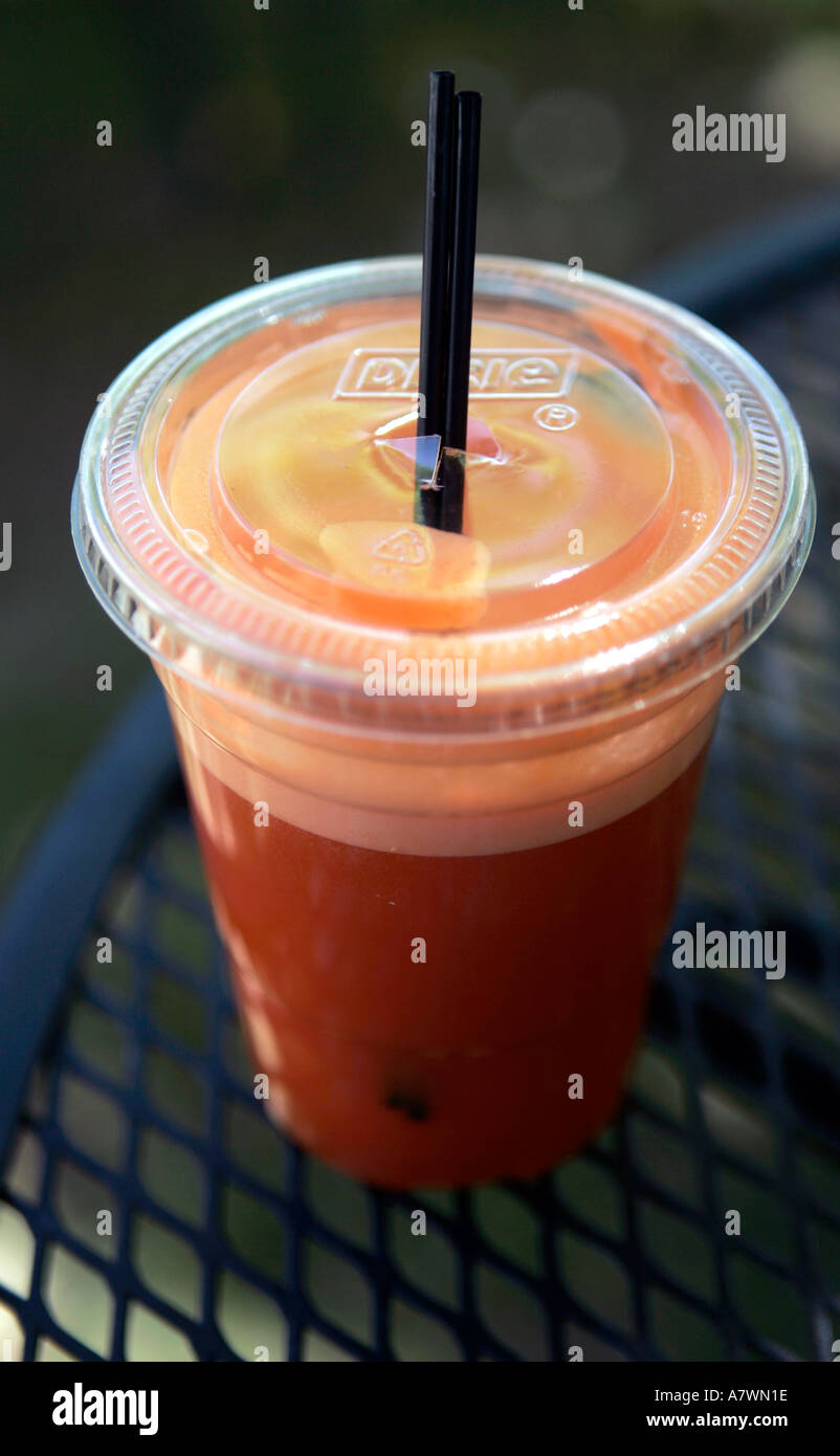 Download Carrot Juice In A Plastic Cup Stock Photo Alamy Yellowimages Mockups