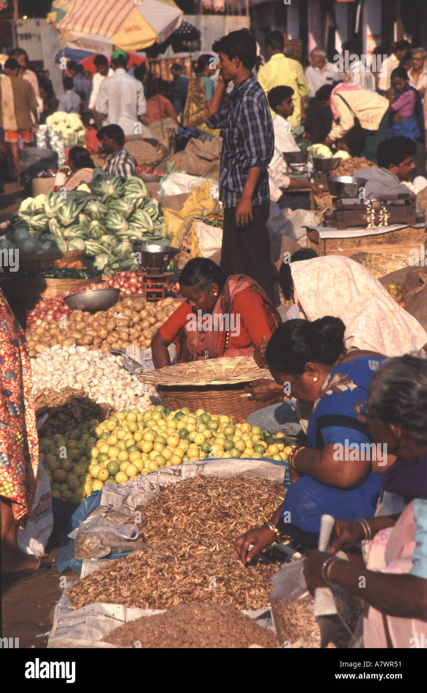 GOA, INDIA. Women selling fruit, vegetables and spices at Mapusa market. Stock Photo