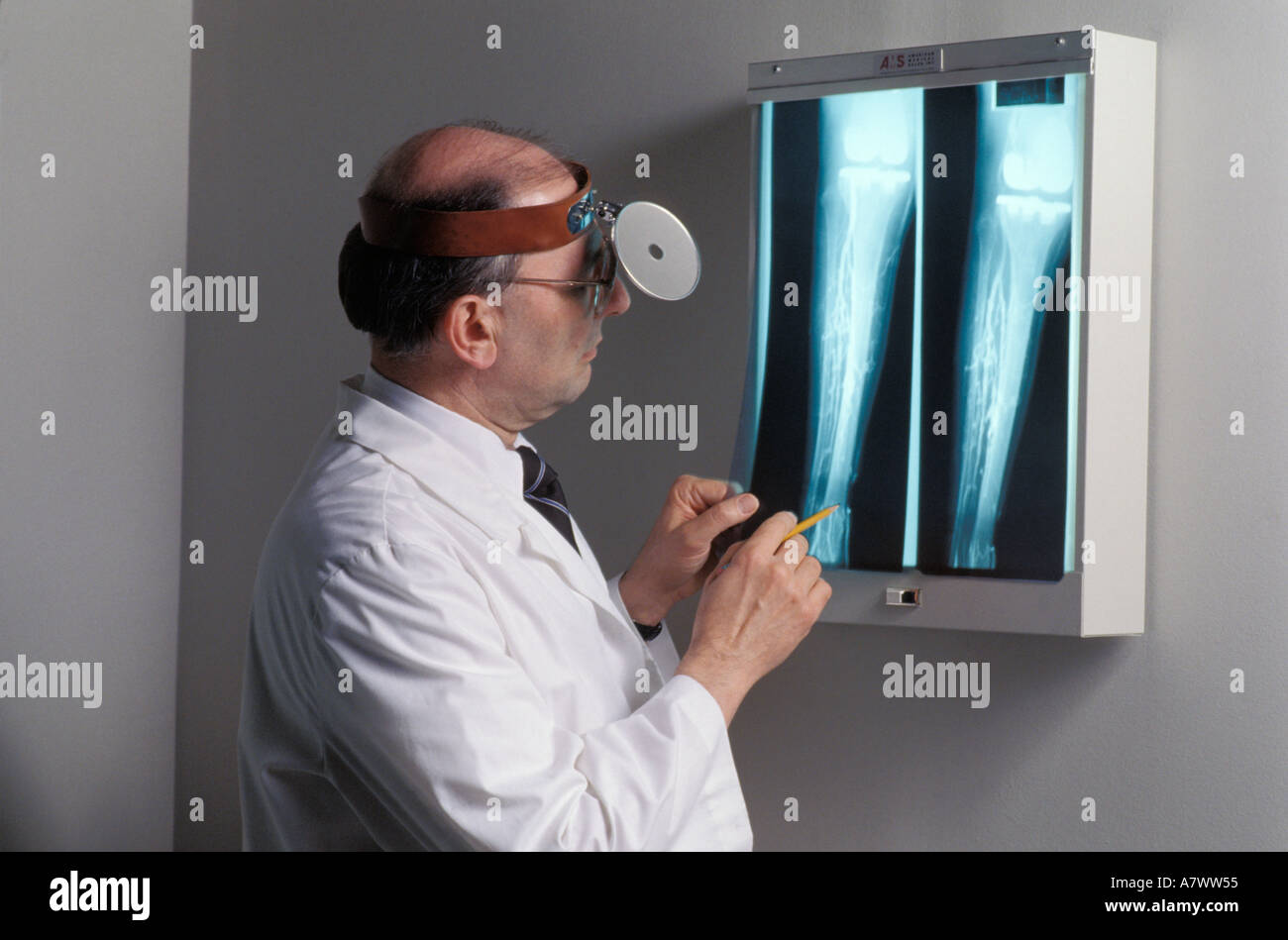 physician doctor reviews x rays Stock Photo