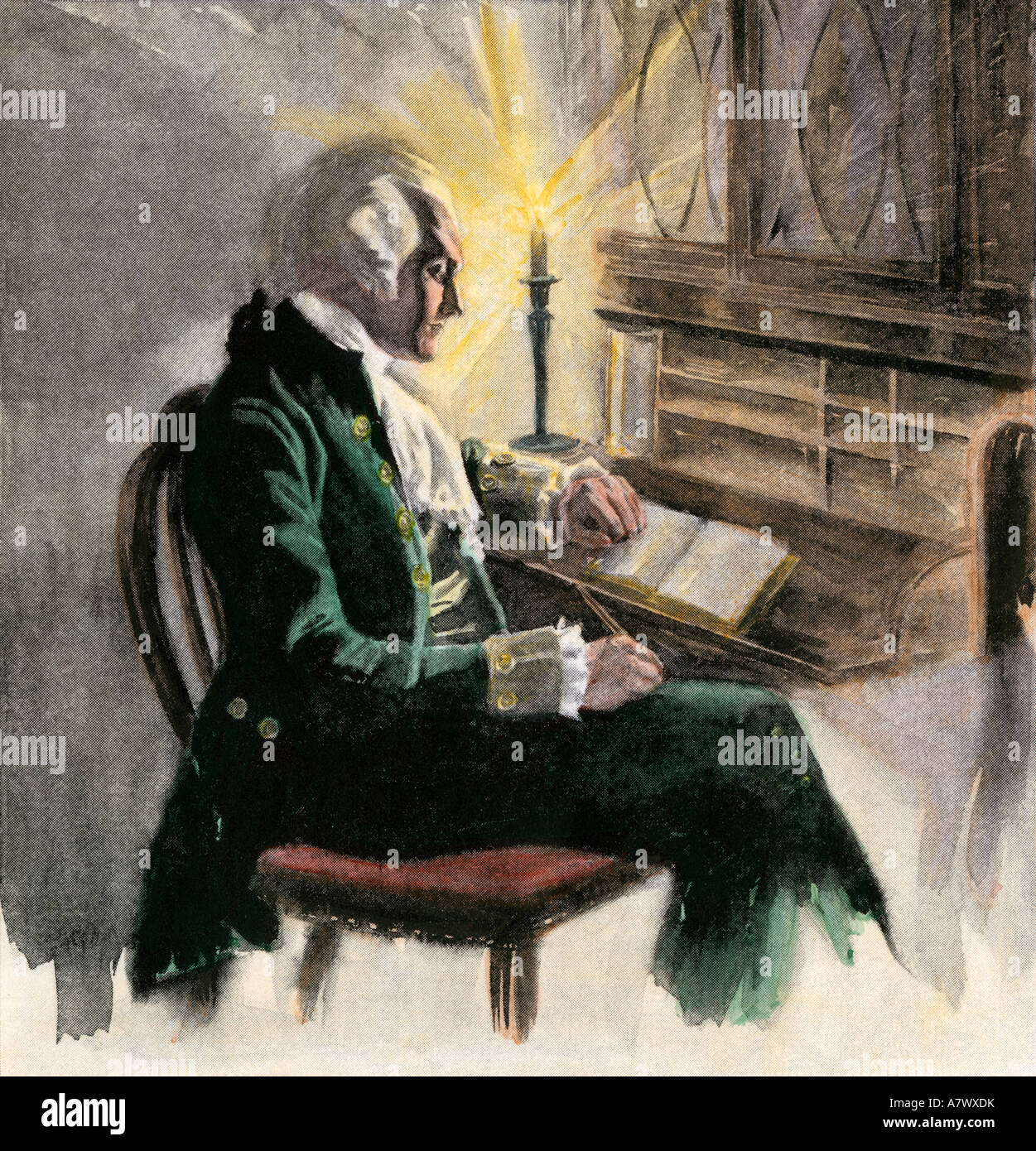George Washington writing at his desk by candlelight. Hand-colored halftone of an illustration Stock Photo
