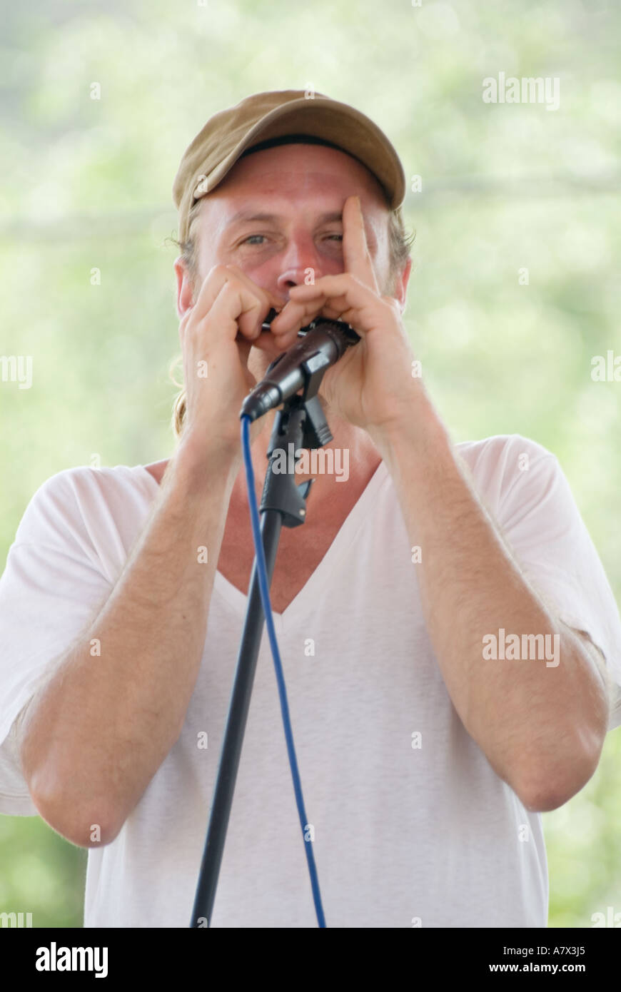 Man playing harmonica hires stock photography and images Alamy