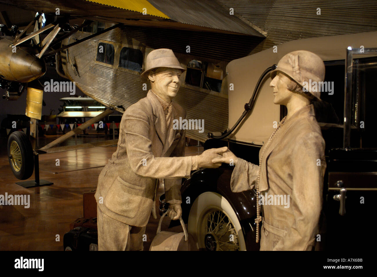 1928 Ford Trimotor airplane with airport farewell scene statues at the Henry Ford Musuem in Dearborn Michigan Stock Photo