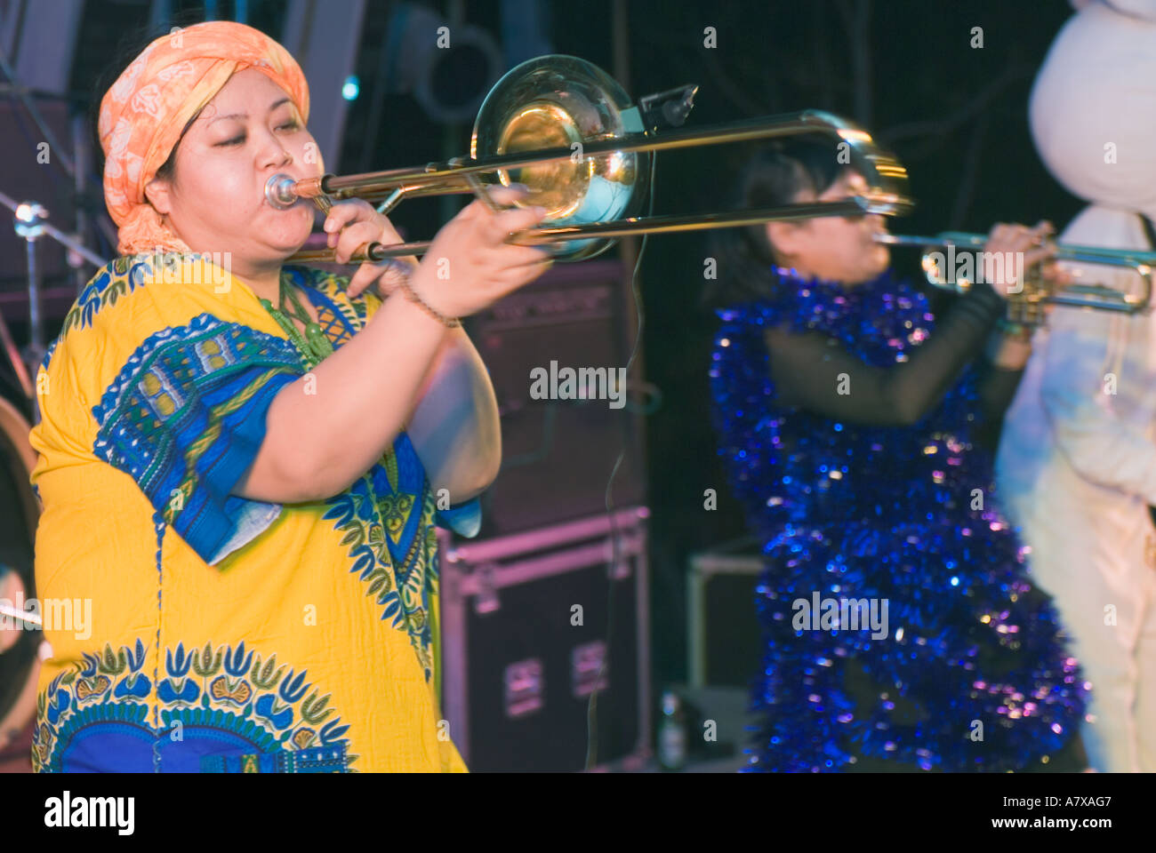 Chinese Woman Playing Trombone In Ska Rock Band Performing Live On Stage Taiwan China Stock Photo