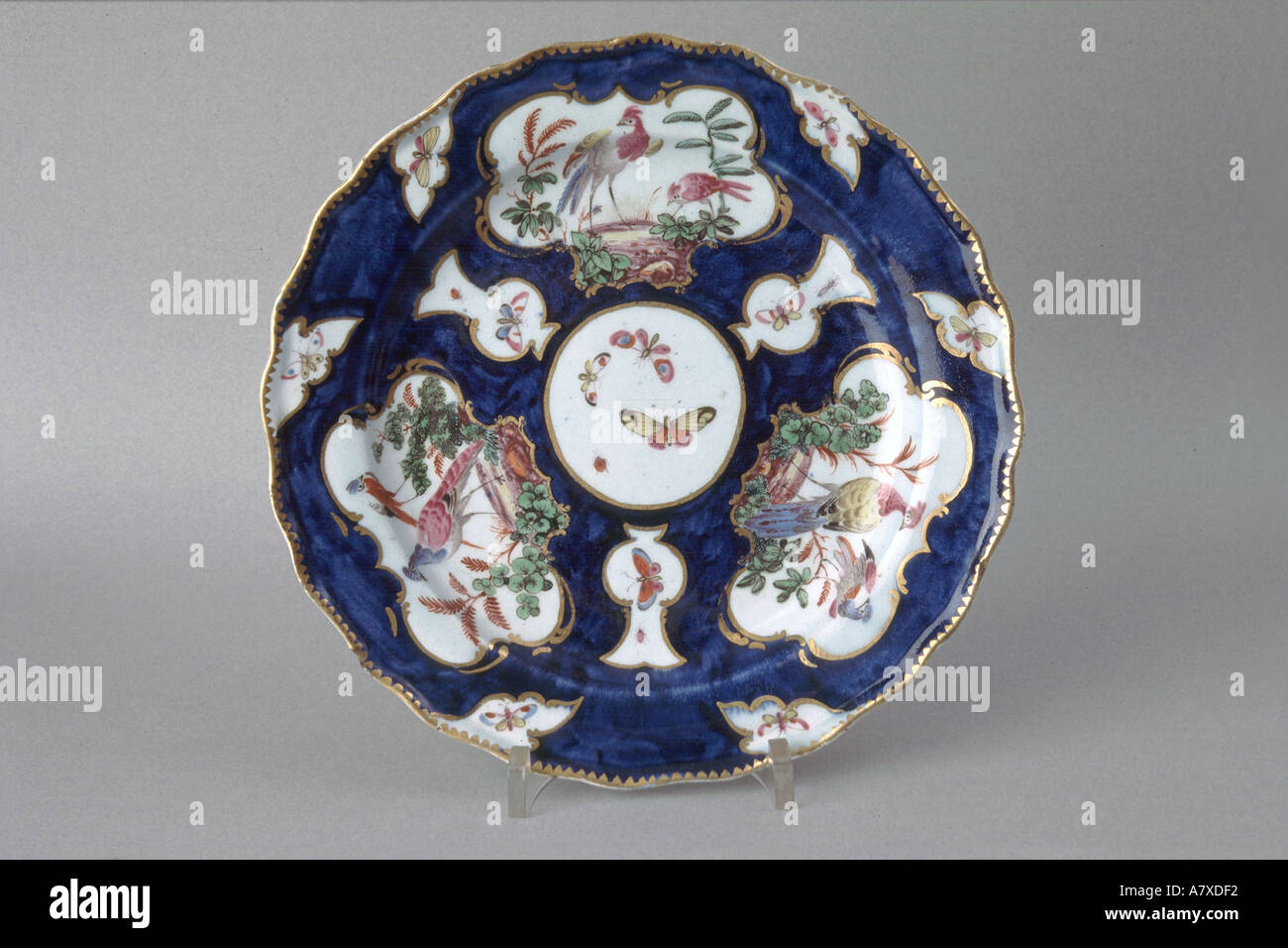 Bow Porcelain a blue ground plate circa 1770 from the collection of the London Borough of Newham Stock Photo