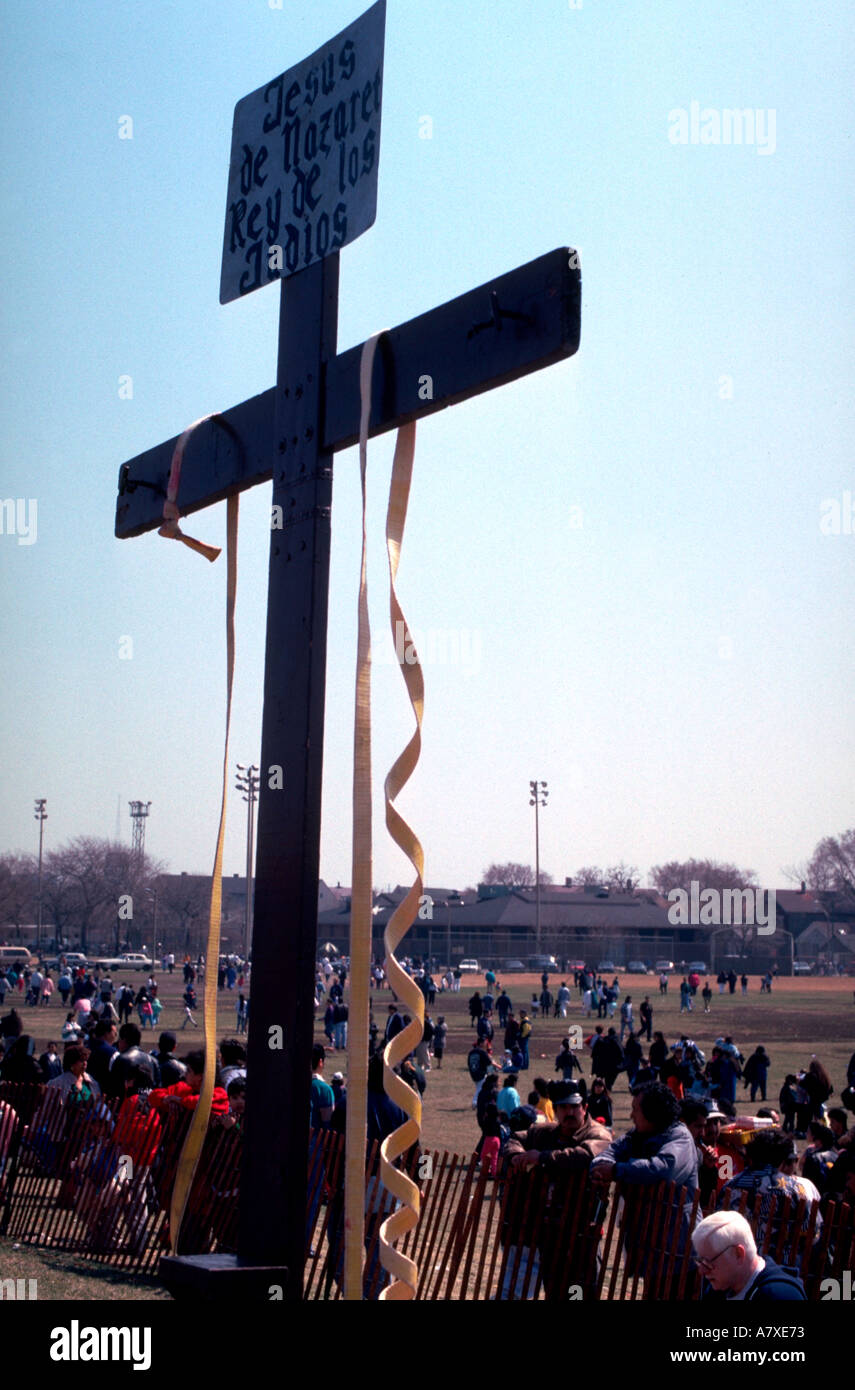 Crucifix at Way of the Cross Procession in Pilsen neighborhood. Chicago Illinois USA Stock Photo