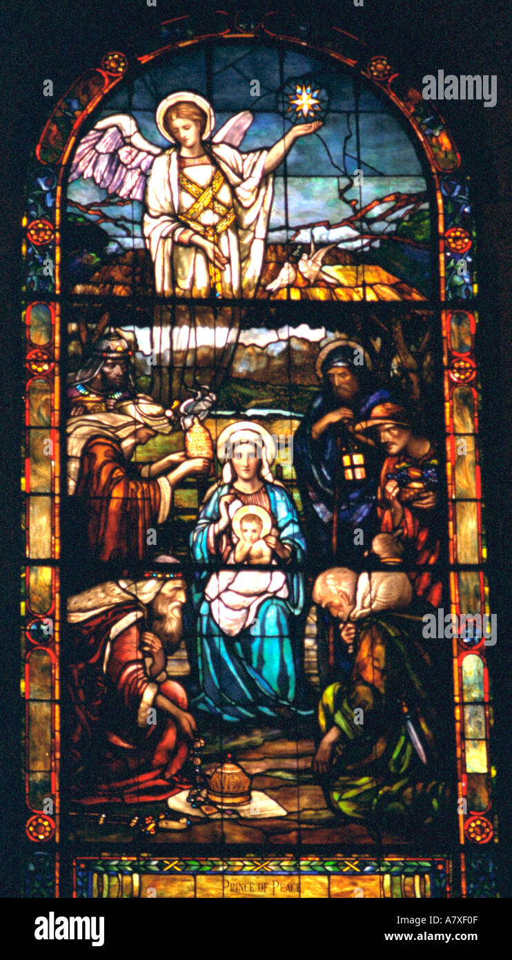 Three wise men Mary baby Jesus and angel on stained glass window. Palo Alto California USA Stock Photo