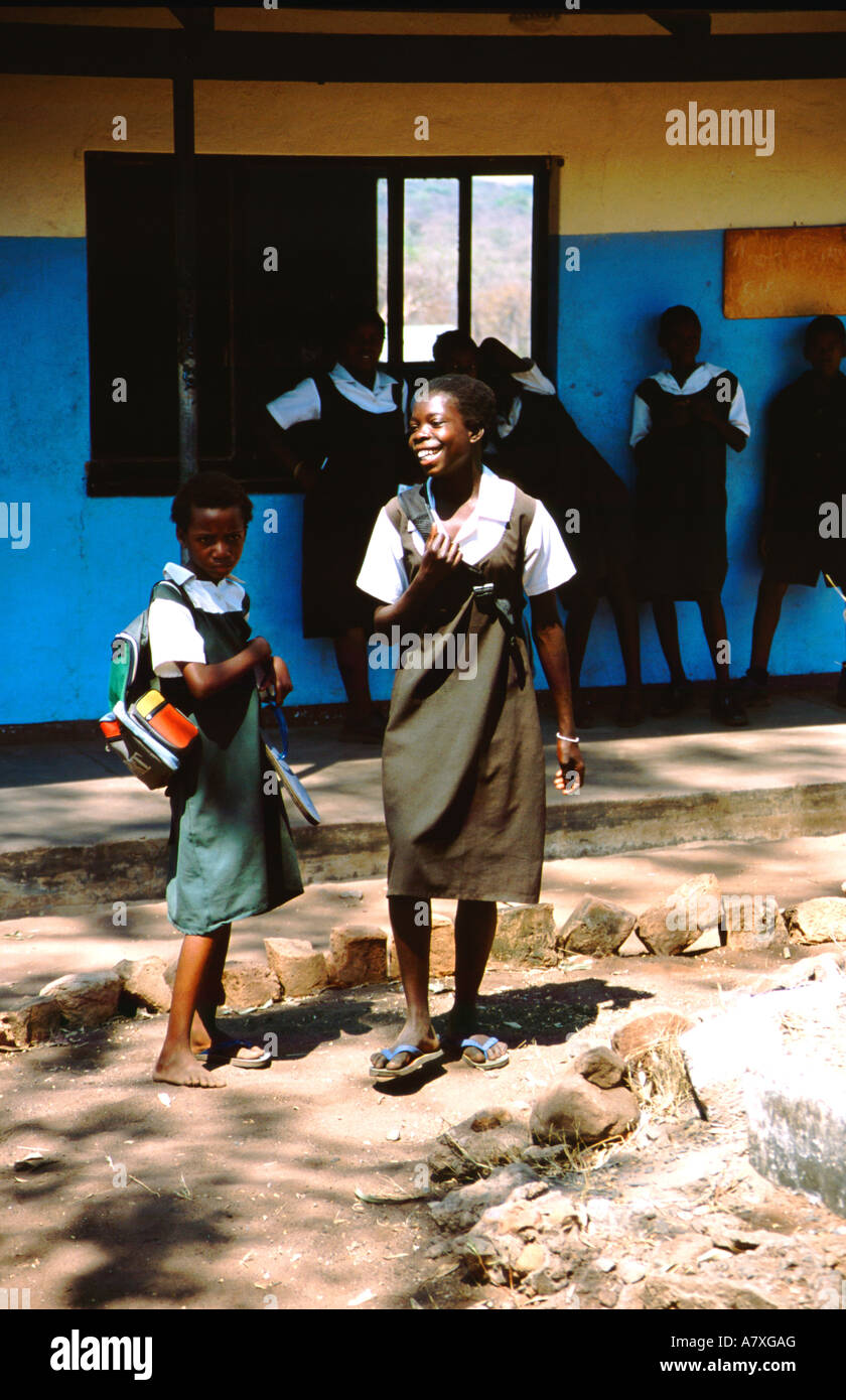 Africa, Zambia, Simonga Basic School. Two young girls in school