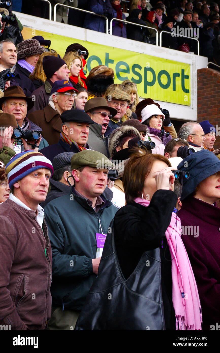 The excited crowds are watching running near the finish line at