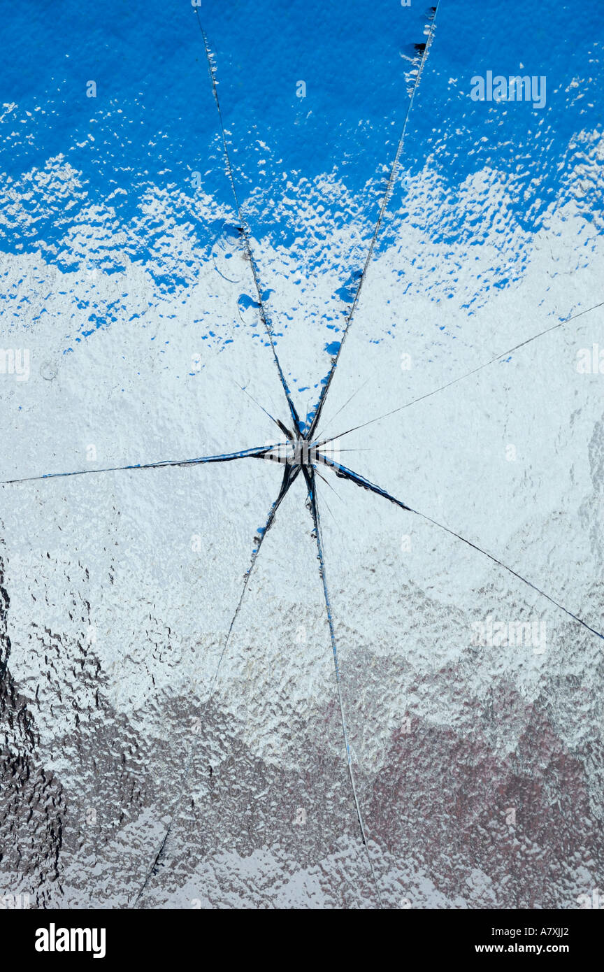 Cracks in ripple / ribbed glass Stock Photo