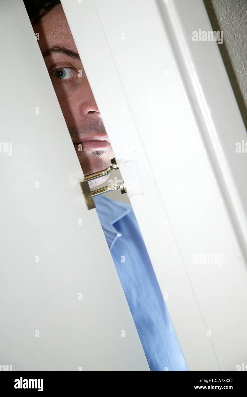 Spying through open door hires stock photography and images Alamy
