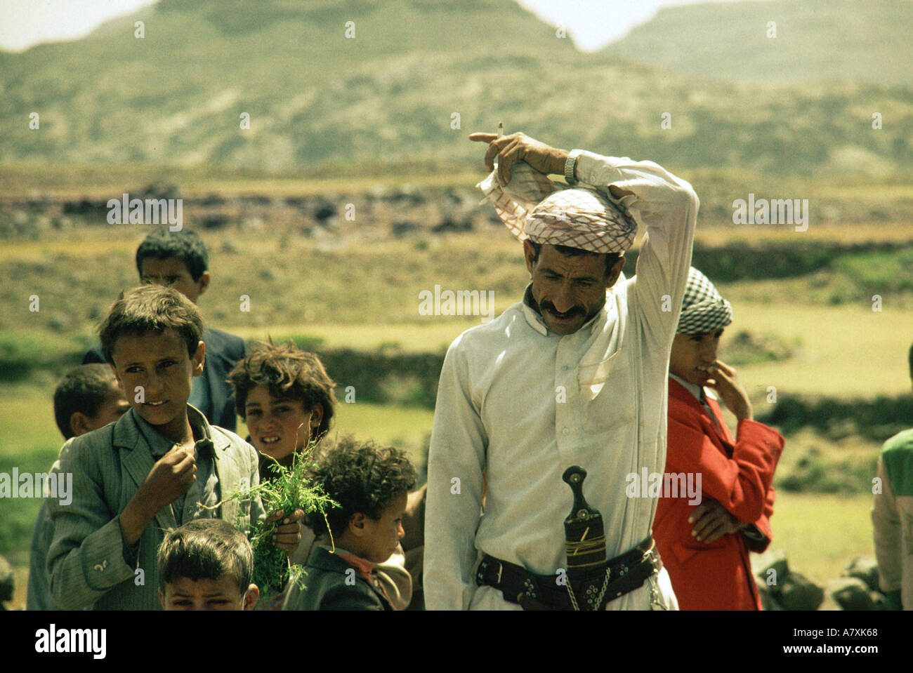 Man with djambia chewiing Qat in the Yemini highlands Stock Photo