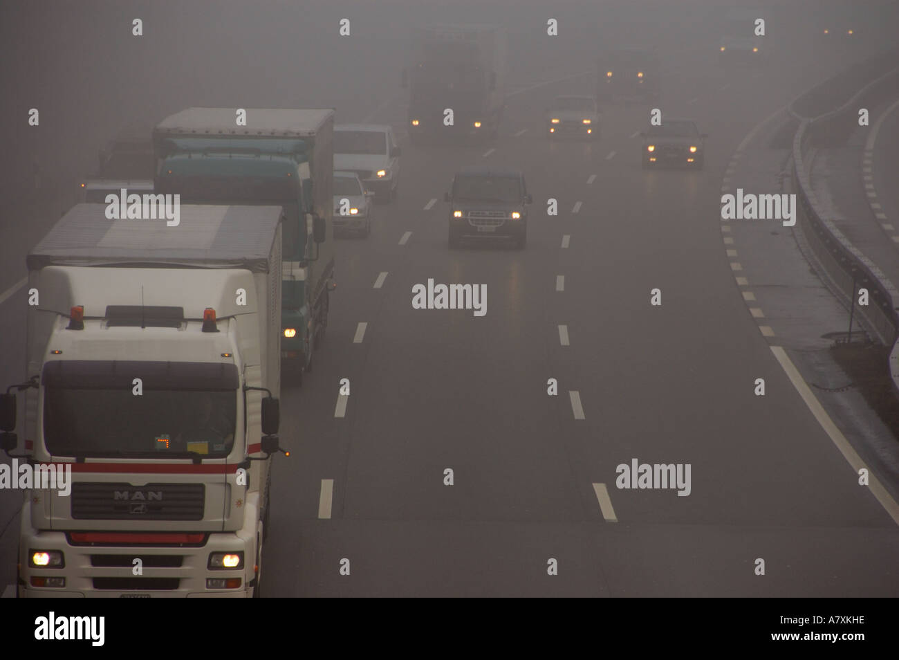 fog on motor highway in switzerland. (c) by uli nusko, ch-3012 bern. Stock Photo