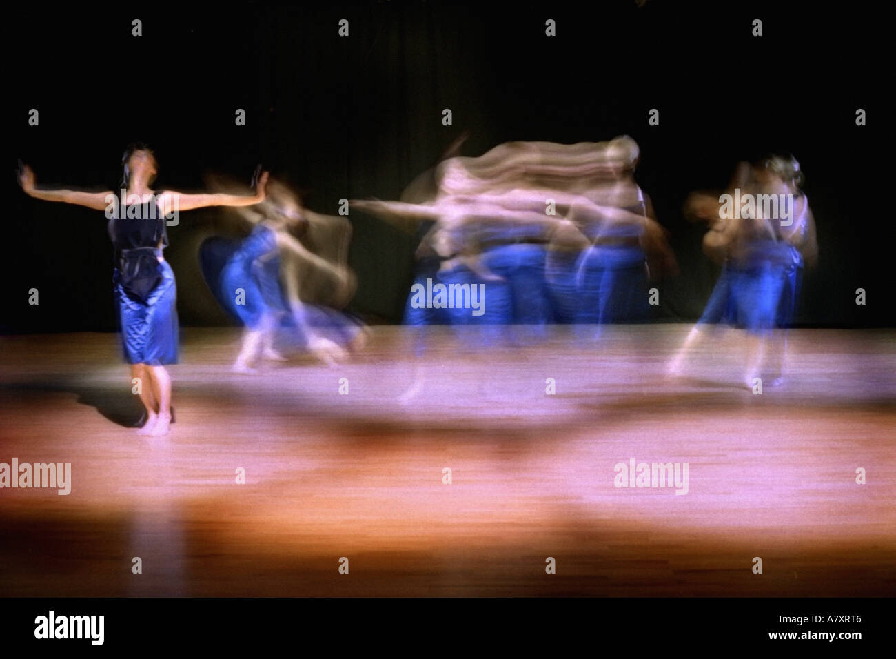 [DANCE PERFORMANCE] WITH [BLURRED MOVEMENT] OF FEMALE [CONTEMPORARY DANCERS] Stock Photo