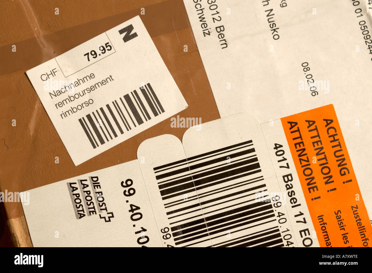 stickers on cash on delivery parcel in switzerland. (c) by uli nusko,  ch-3012 bern Stock Photo - Alamy