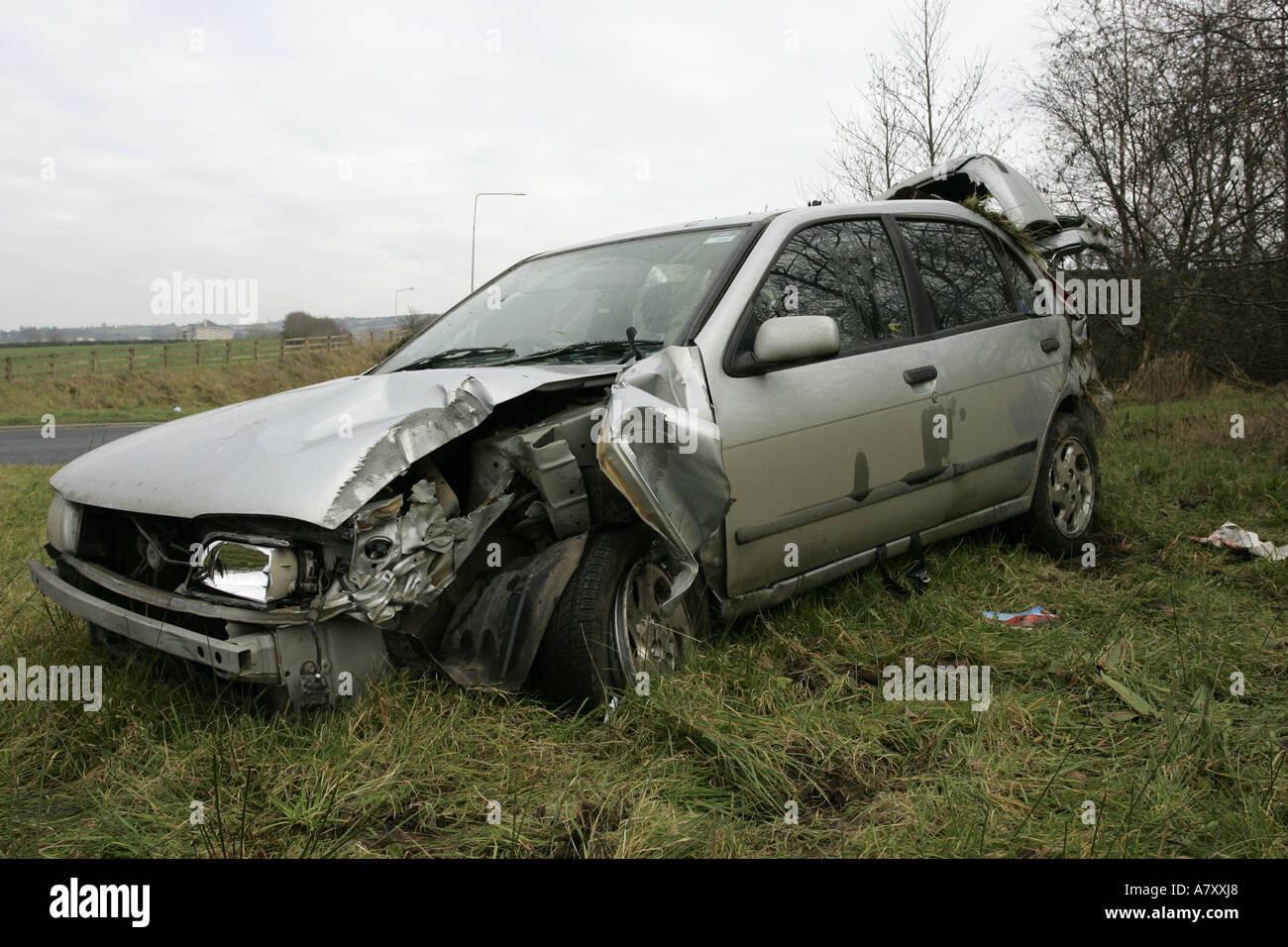 road traffic accident with crashed car on a roundabout outside Letterkenny County Donegal Republic of Ireland Stock Photo
