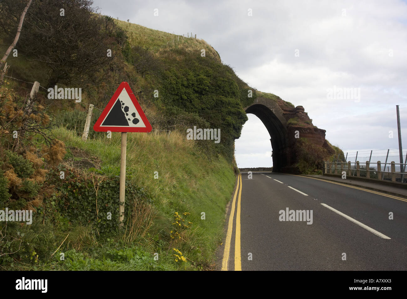 falling rocks roadsign at red arch waterfoot glenariff county Antrim Northern Ireland Stock Photo