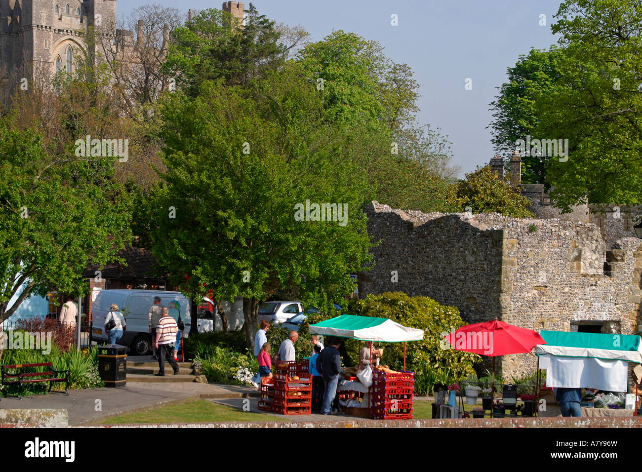 People buying food at a traditional English Farmers market, Arundel, West Sussex, UK Stock Photo