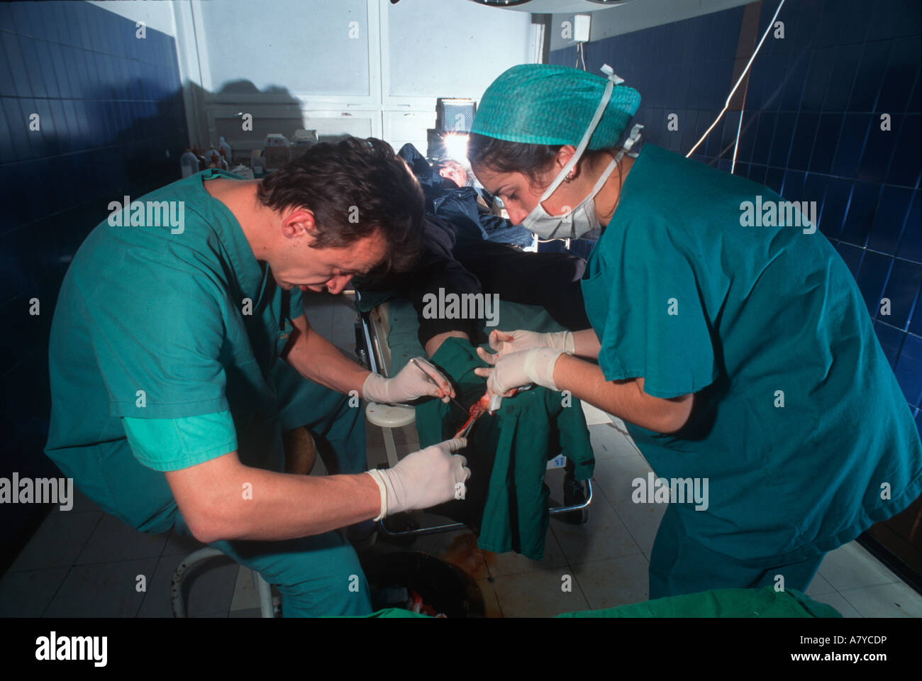 Serbian doctor works on a wounded Bosnian Serb patient. Stock Photo