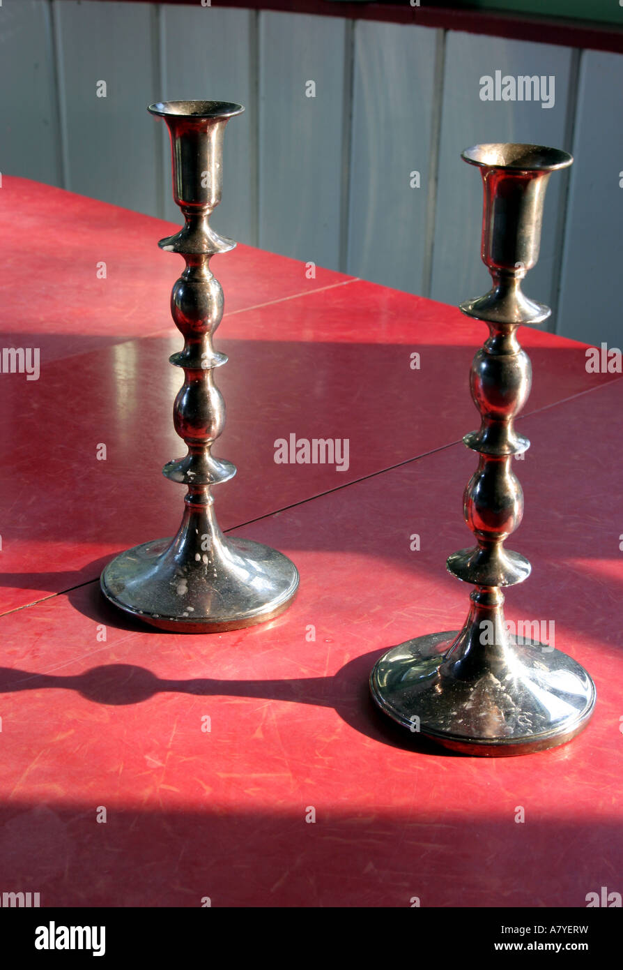 Pair of metal candlestick holders Stock Photo Alamy