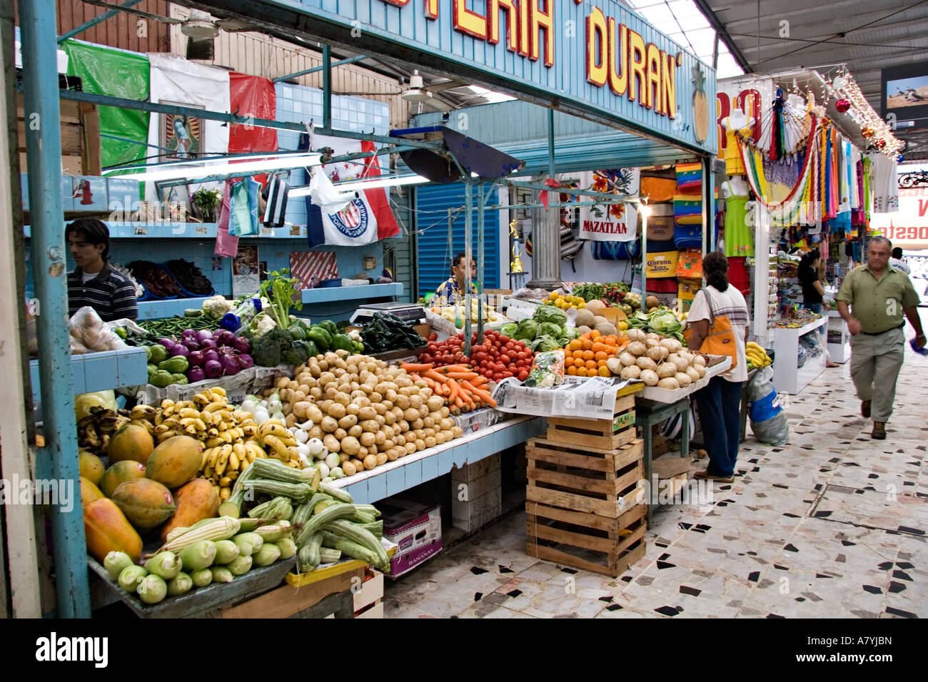 North America, Mexico, Mazatlan. A vegetable and fruit stand in the