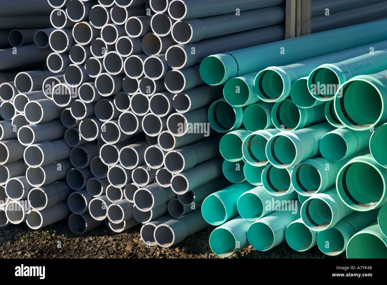Stacks of PVC pipe at a plumbing supply facility Stock Photo Alamy