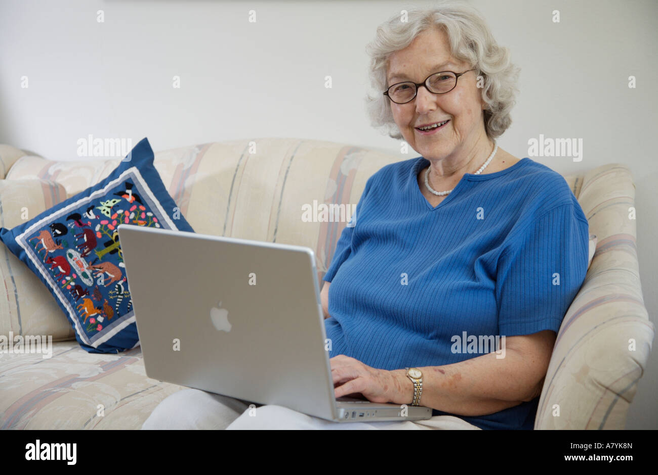 Senior woman using notebook computer Stock Photo