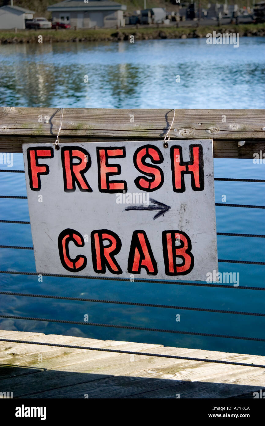 Sign advertising fresh crab on the docks in Newport Oregon Stock Photo