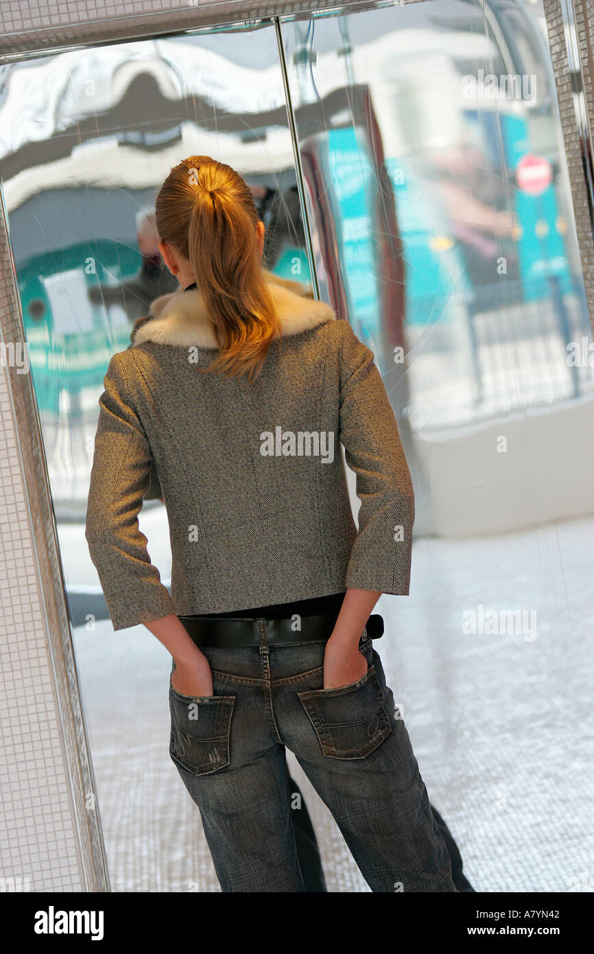 Blonde female rear view hi-res stock photography and images - Alamy