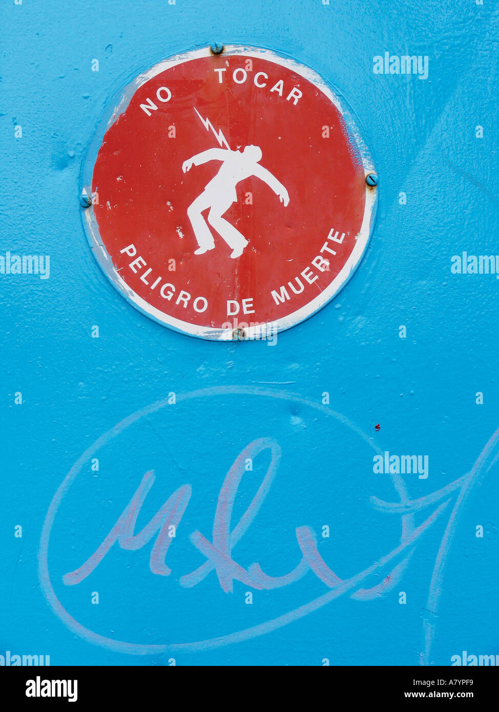 Do Not Touch Danger of Death Warning sign in Spanish language Stock