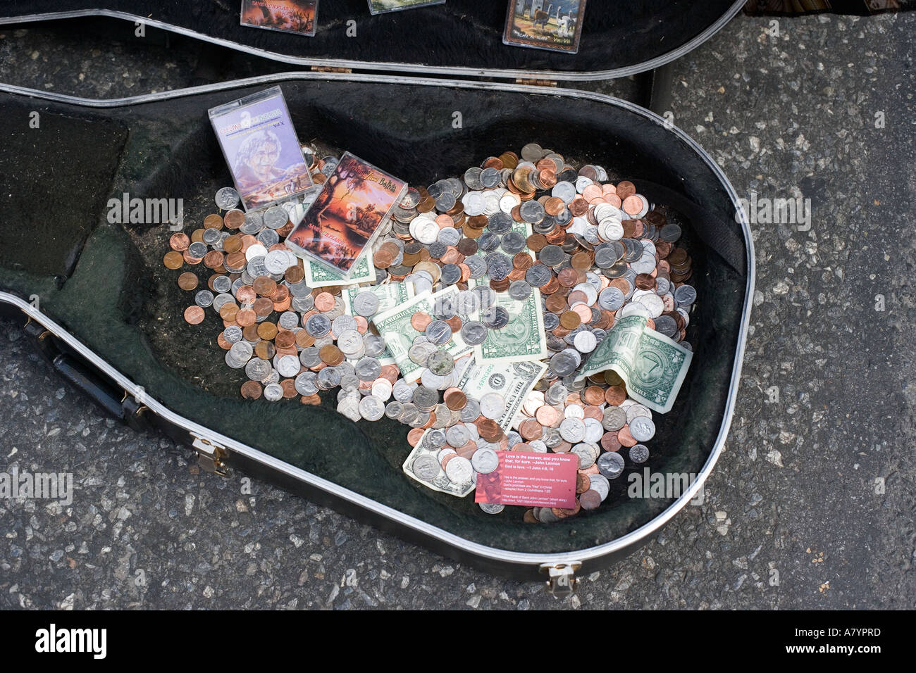 guitar case filled with money Stock Photo