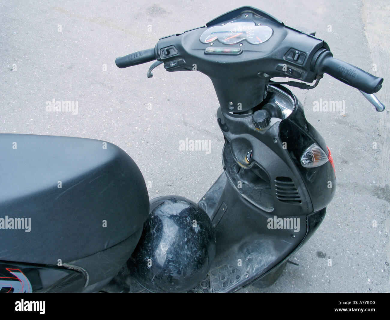 Motor scooter and helmet Stock Photo
