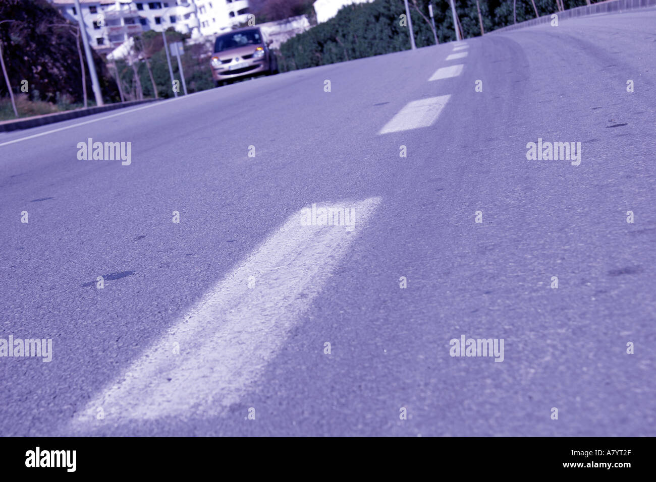 Symbolic markings giving motorists instructions on highway Stock Photo