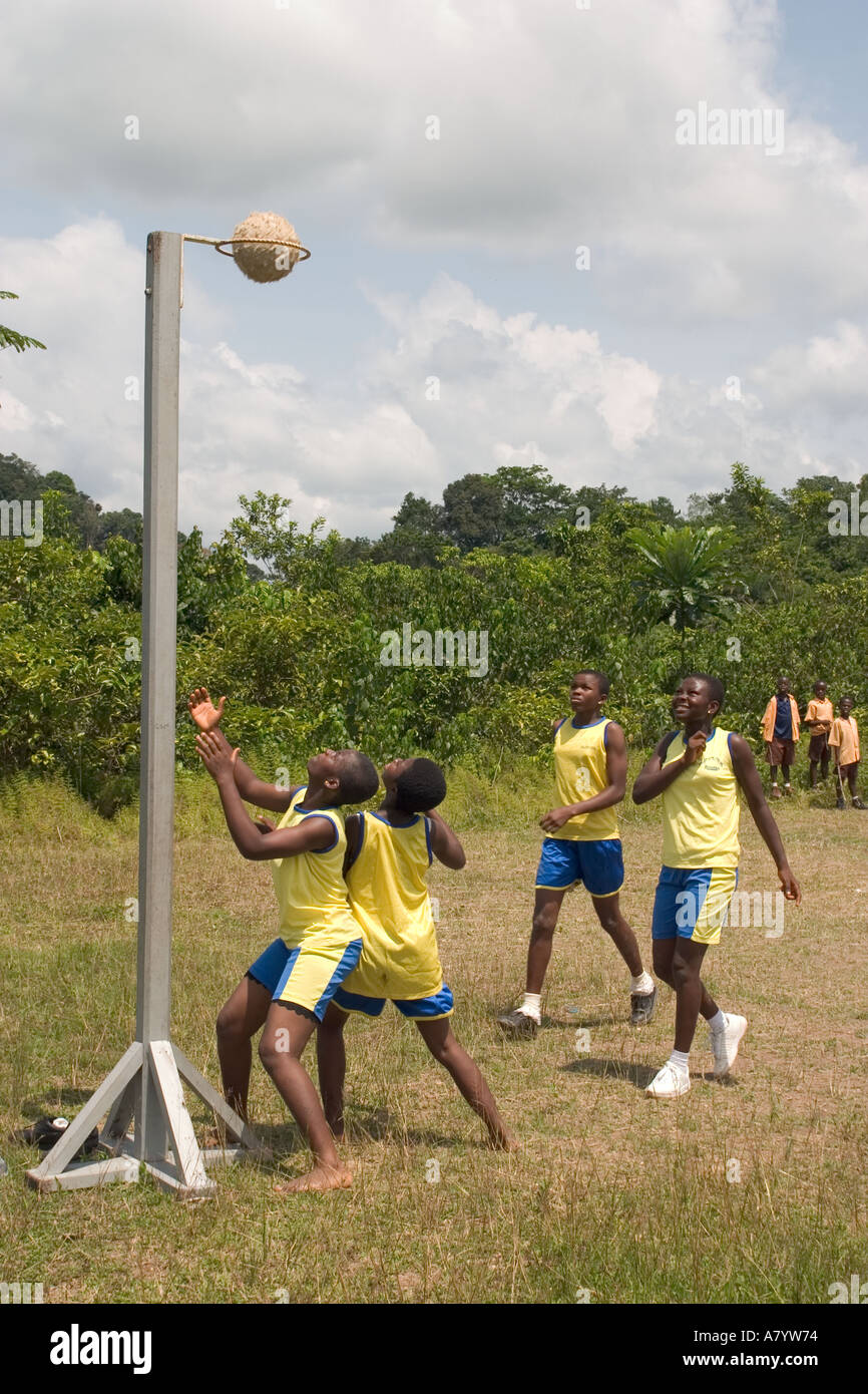 Teenage girls playing in a school netball match practice on sports