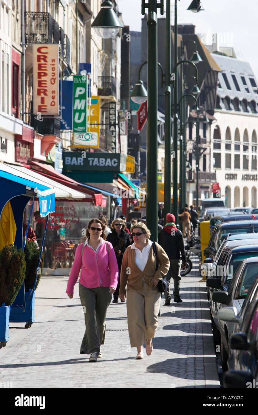 Shoppers walking along the Boulevard Fernand Moureaux in Trouville Normandy France Europe Stock Photo