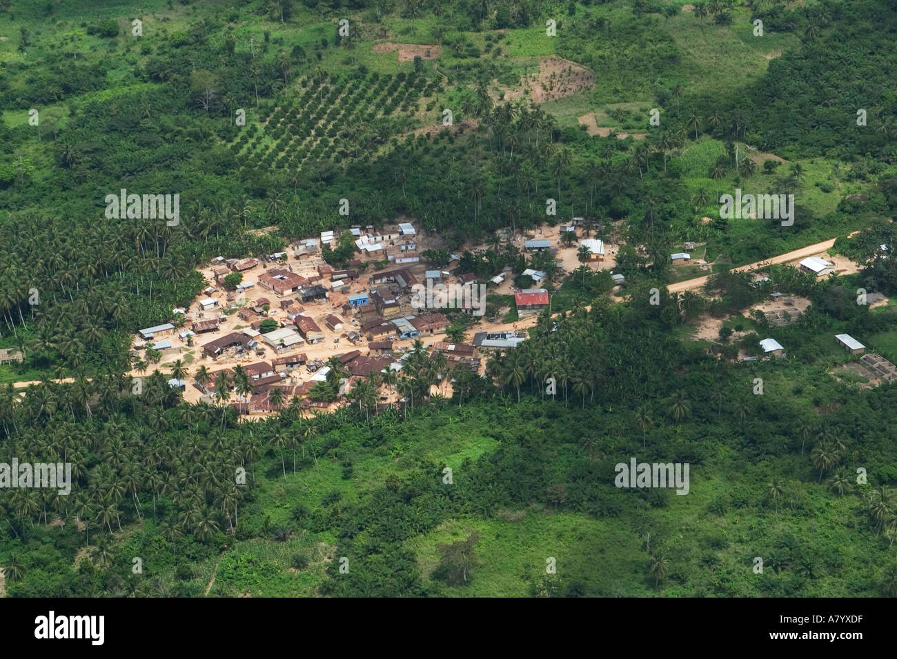 Aerial view of rural village with small coffee plantation to the north in Ghana West Africa Stock Photo