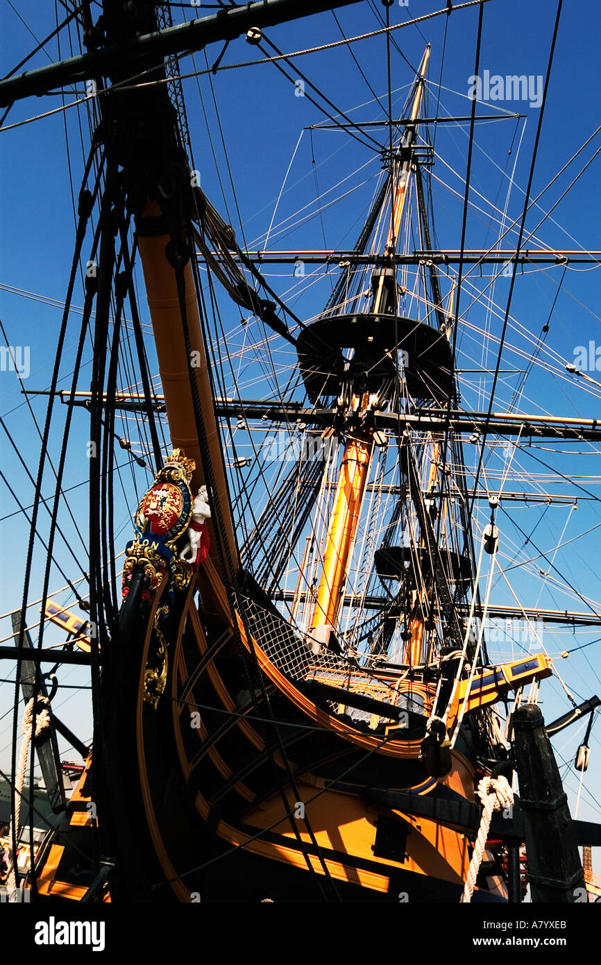 HMS Victory, world's oldest naval ship and famous104 gun warship in Historic Portsmouth Dockyard. Bow showing figurehead and coat of arms. England UK Stock Photo