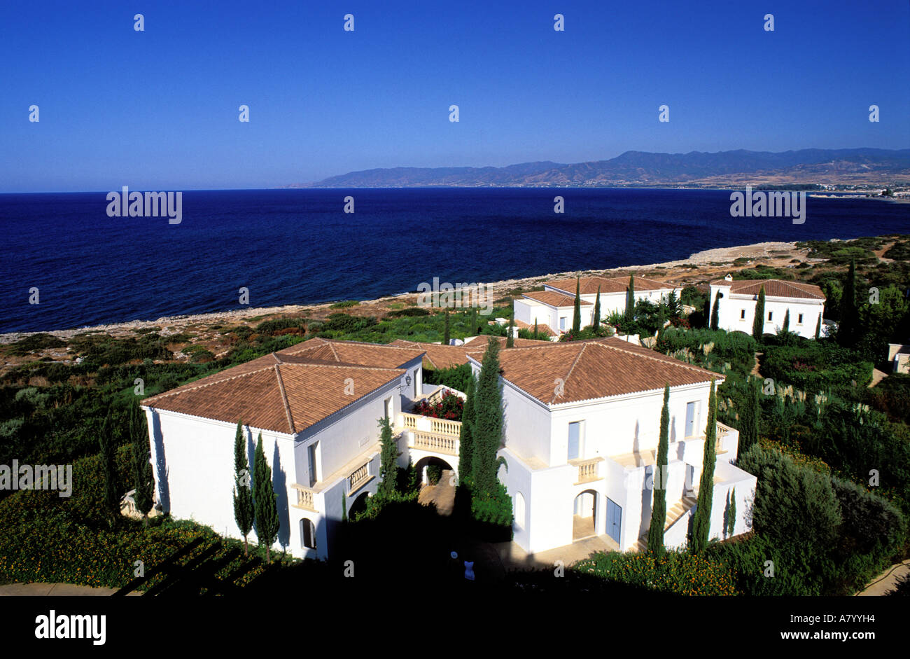 Cyprus, Pafos District, Akamas Peninsula, Lakki town, Anassa Hotel, jet set home, villas in a garden on the seaside Stock Photo